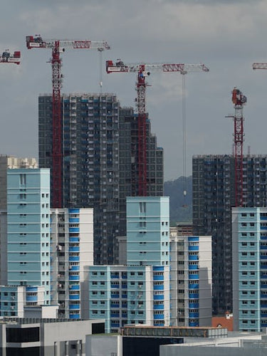 Construction site with cranes Singapore mobile banner